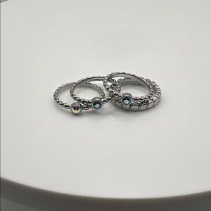 317. QUDO set of 4 stainless steel stackable rings